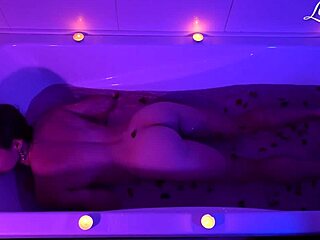Fit teenager Leria glow masturbates with dildo and fingers in the bathtub