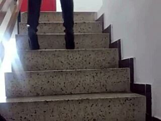 Naughty fanny BBCN on the stairs of an exhibition