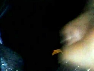 Sloppy deepthroat action with a black head in the car late at night