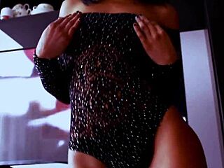 Young amateur dances with breasts exposed