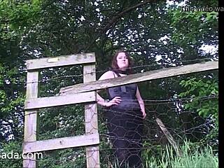 The chubby British babe slowly gets nude outside in the European countryside, revealing her full figure