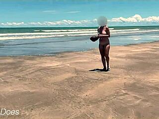 my wife flashes boobs while playing nude football on the beach