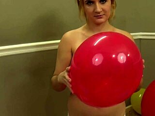 Fifi Foxx fills two balloons with her breasts in a fetish video