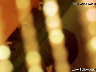 Bollywood actress undresses and dances in striptease.