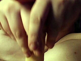 A woman experiments with unconventional techniques to please men in a homemade video