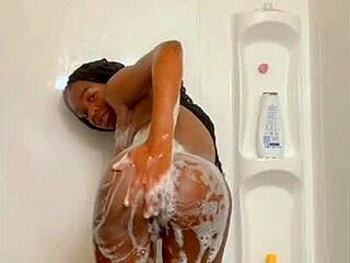 Black girl takes a sexy shower in the bathroom