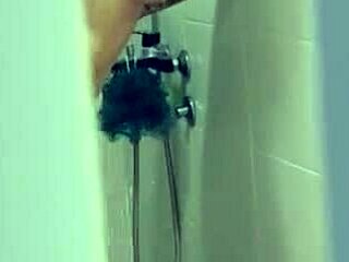 Caught stepsister banging with dildo in shower during steamy homemade moment