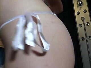 kirstin teases with panty striptease, ripping clothes in her fetish play.