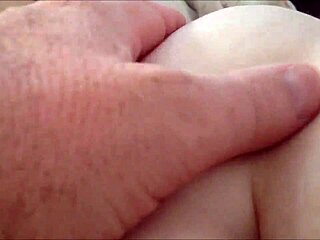 Amateur milf rubs her hairy pussy at home