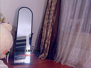 this dark hair stunner is on cam showing her big tits