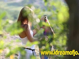 Blonde woman fingers herself in wilderness masturbation