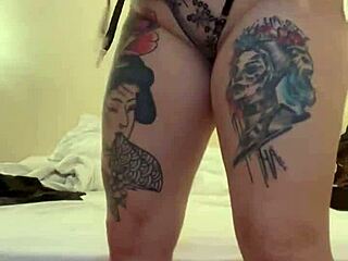 Beautiful tattooed whore dancing naked on her knees