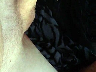 A blonde prostitute gives a deep blow job to a strange man