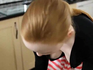 Saggy redhead's downblouse glimpse in kitchen sparks voyeuristic interest
