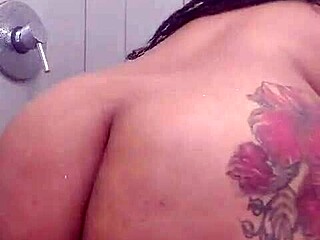 Fat MILF enjoys shower solo pleasures