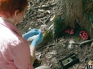 A scientist observes a hot scene of two people having sex in the great outdoors