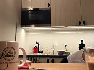 Softcore kitchen spy cam action with braless Sylvia