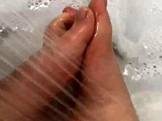 Hungarian Babe Removes Nylon For Footjob In Shower