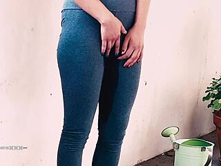 Asian tina desperate to pee on balcony in leggings