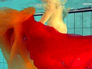 Petite teen Nastya's outdoor striptease in the pool