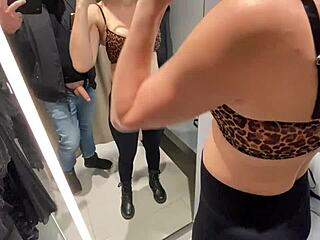 Slutty wife gets a blow job in the shop changing room