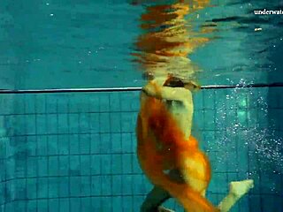 Petite teen Nastya's outdoor striptease in the pool