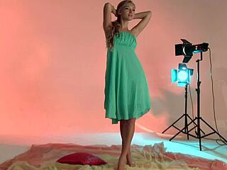 Teen model with golden hair poses beautifully backstage in nude