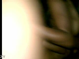 African American woman giving a blowjob to a white man with a big dick