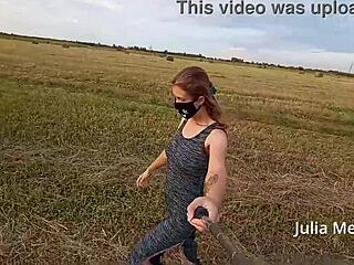 juli smith undresses in the field