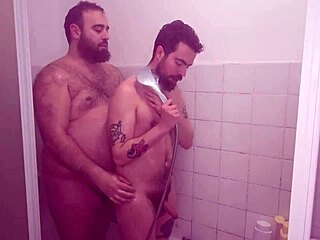 A steamy shower scene with a hot gay couple and a big dick lover