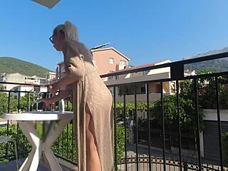 Public balcony show of the skin: solo pleasure and exhibitionism
