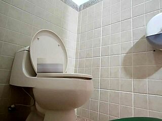 amateur camera captures public bathroom moments in madrid shopping center