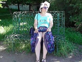 Public showing off: Mature hairy nymph in transparent dress
