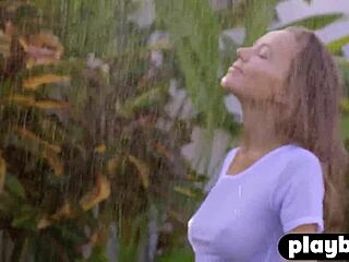 Katya Clover's solo striptease in wet clothes and rain