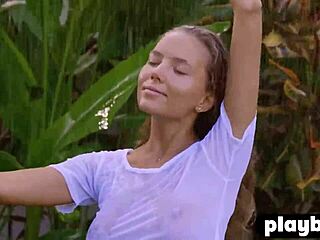 Katya Clover's solo striptease in wet clothes and rain