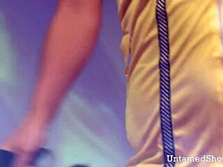 Horny brunette stripper rips clothes for intense masturbation on stage.