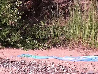 hidden cam catches milf getting slammed on beach