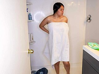 Latina wets jeans, strips panties, and showers off