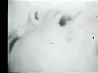 Goth lesbian explores softcore bondage in retro blue film with mirrors