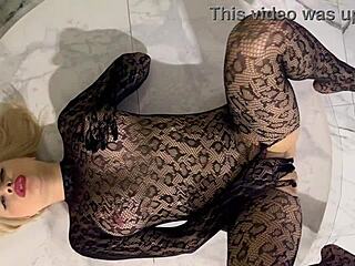 BLONDE TATTOOED SLUT SUCKS AND FUCKS IN FISHNETS