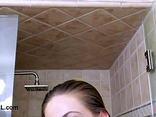 lovely teen brunette enjoys a refreshing shower moment