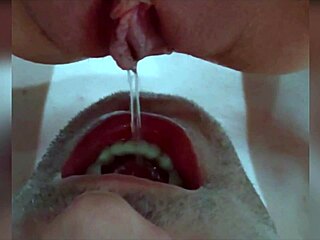 dominatrix forces pee drinking in mouth. gosh, she swallows it all! 😳
