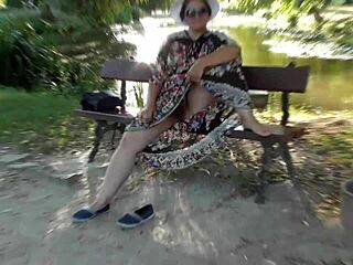 hairy mature woman flashing in the park under skirt.