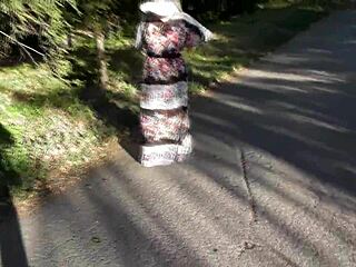 hairy mature woman flashing in the park under skirt.
