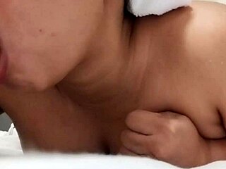 Chubby busty beauty sucks dildo