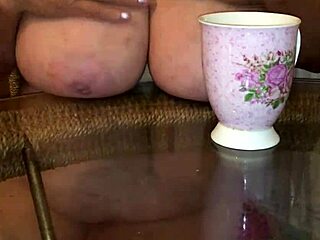 this granny has massive 34jj boobs getting off hard