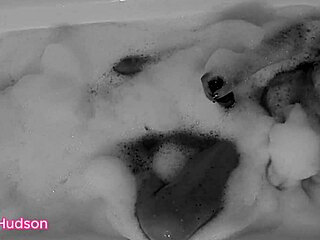 Kity Hudson enjoys a steamy bath with her favorite toy for intense pleasure