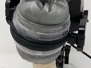 In This Sex Toy Demonstration, The Rubjoy Robot Shows Masturbation With Fleshlight Toys