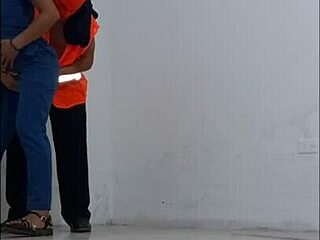 Cleaner Seduces Nurse in Office Hallway