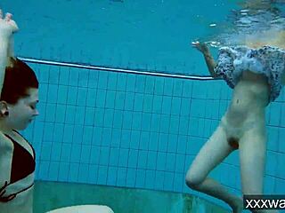 Beautiful russian girls enjoy swimming in the pool wearing bikinis